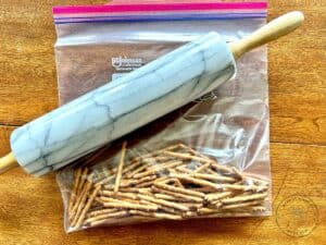 pretzels-in-a-zip-lock-back-with-a-rolling-pin-ready-to-crunch-them.jpg