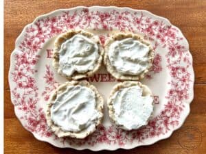 strawberry-pretzel-pie-cookies-with-a-cream-cheese-filling-on-a-beautiful-red-plate.jpg