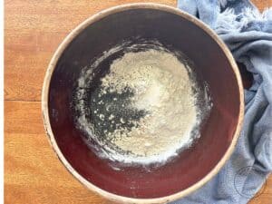 lemon-poppy-seed-bread-with-flour-poppy-seeds-baking-powder-in-a-large-red-bowl.jpg
