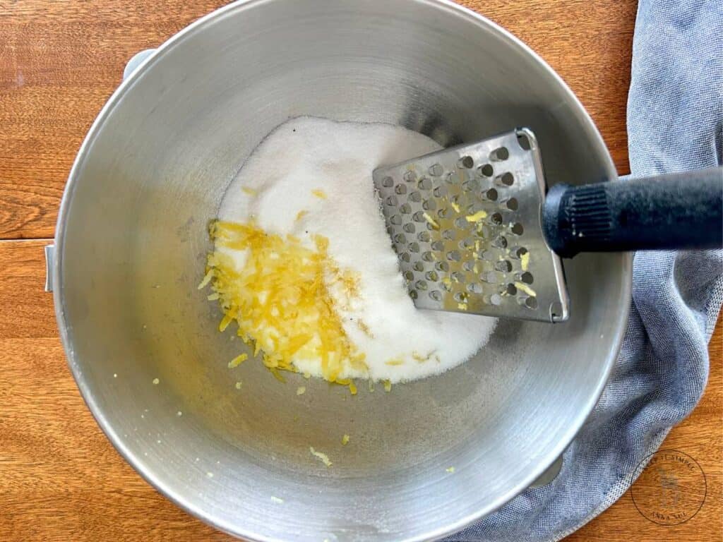 lemon-poppy-seed-streusel-bread-with-graded-lemon-zest-and-sugar-in-a-large-bowl.jpg